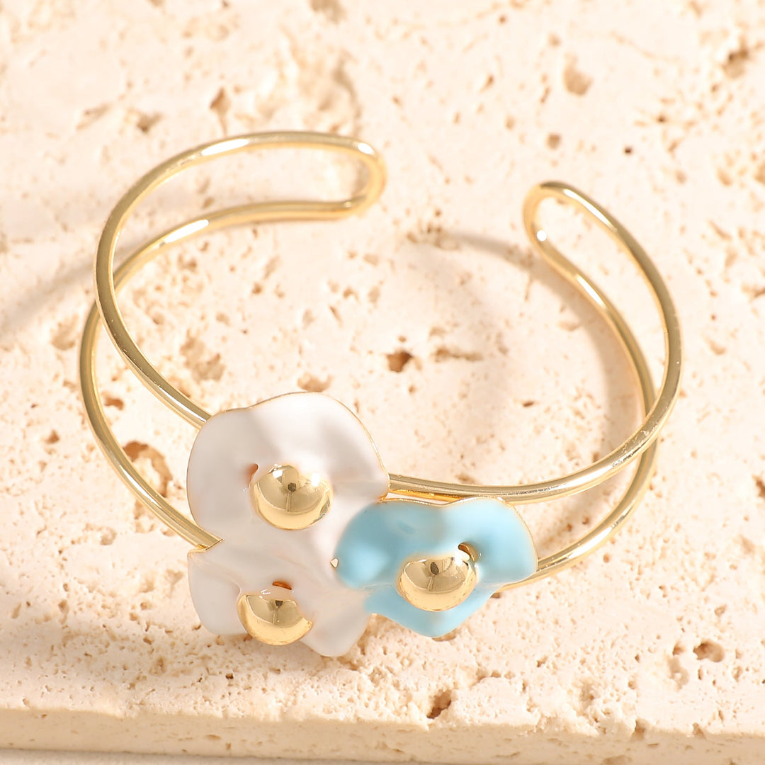 Women's bangle with elaborate floral design Tom Cottons