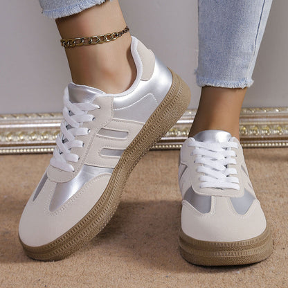 Women’s sporty sneakers with satin-finish upper material and retro design