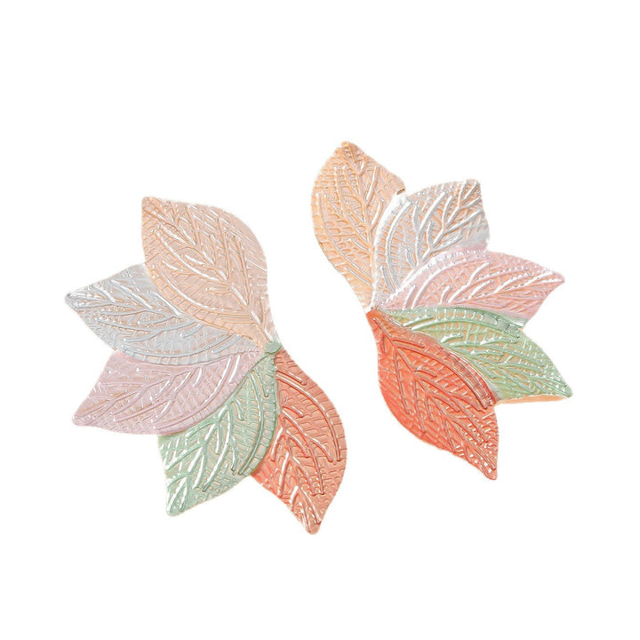 Women’s hair accessory with elaborate leaf design Tom Cottons