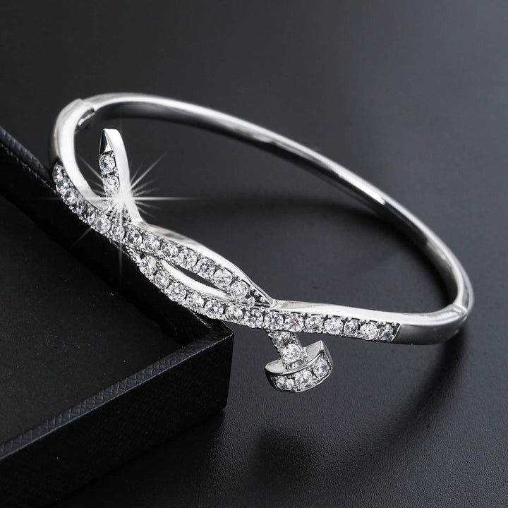Ladies bracelet with elaborate infinity symbol and sparkling zirconia Tom Cottons
