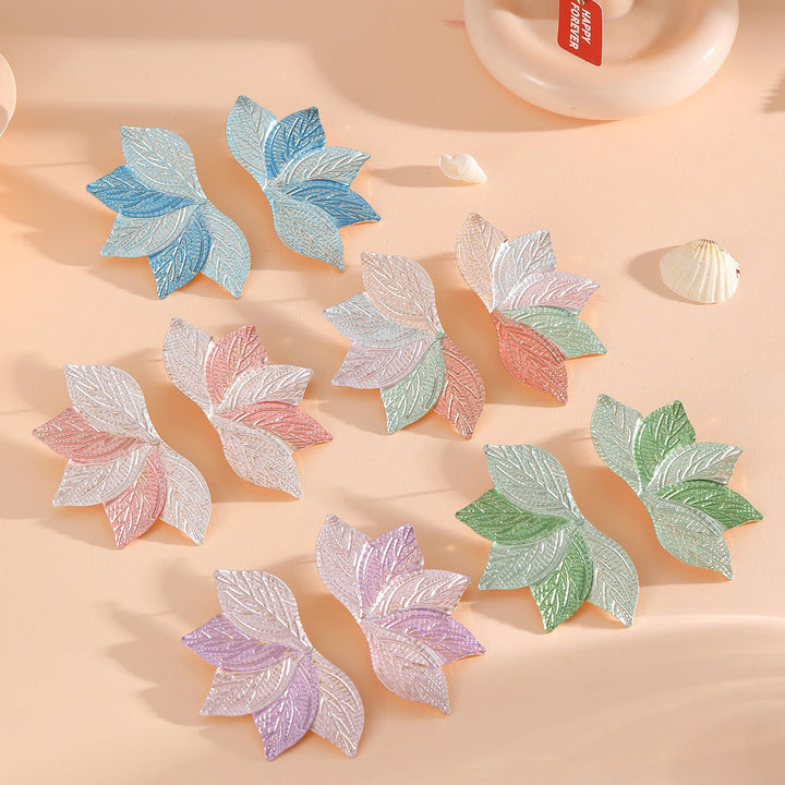 Women’s hair accessory with elaborate leaf design Tom Cottons