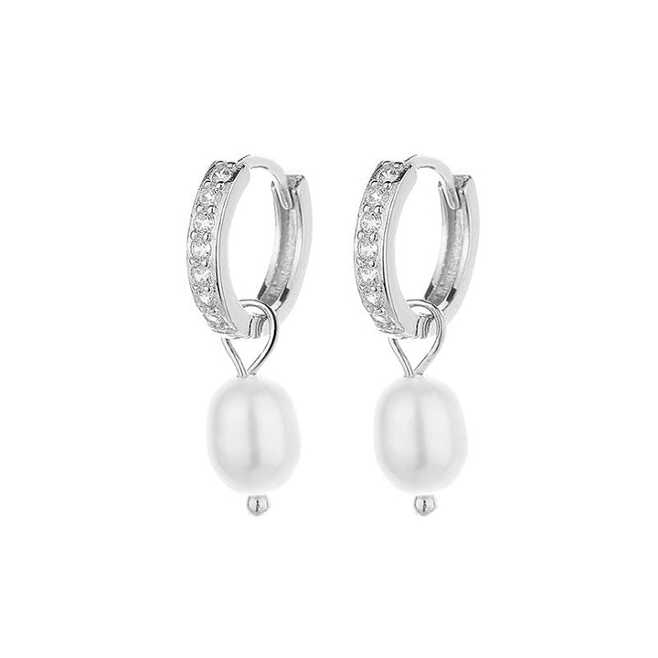Ladies earrings with elegant zirconia decorations and pearl pendants Tom Cottons