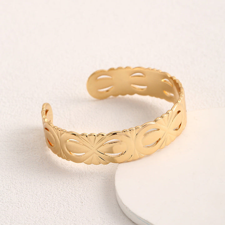 Ladies Open Bangle with Elegant Structure Design Tom Cottons