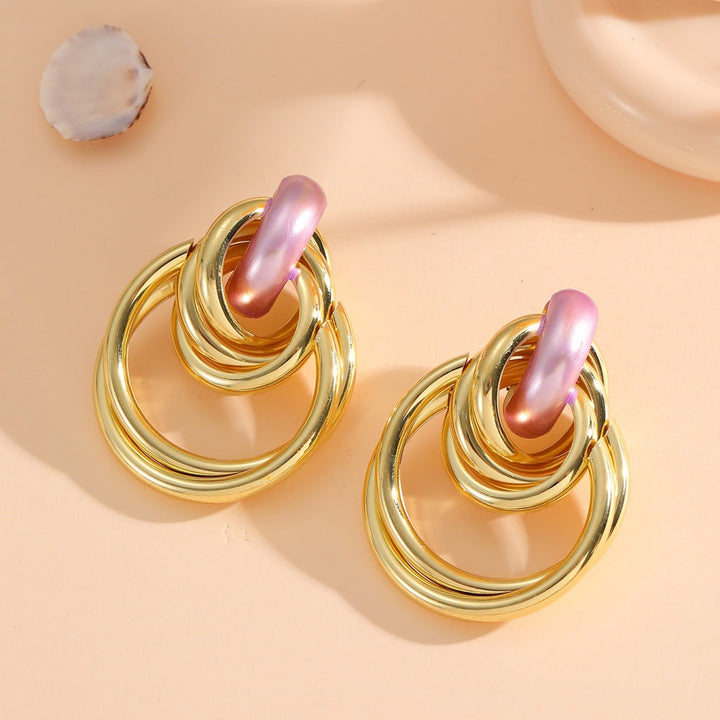 Women's Hanging Earrings with Elegant, Sculptural Design Tom Cottons