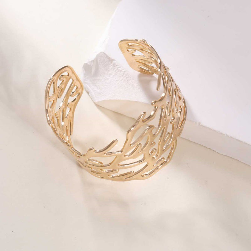 Women's Open Bangle with Elegant Wave Design Tom Cottons