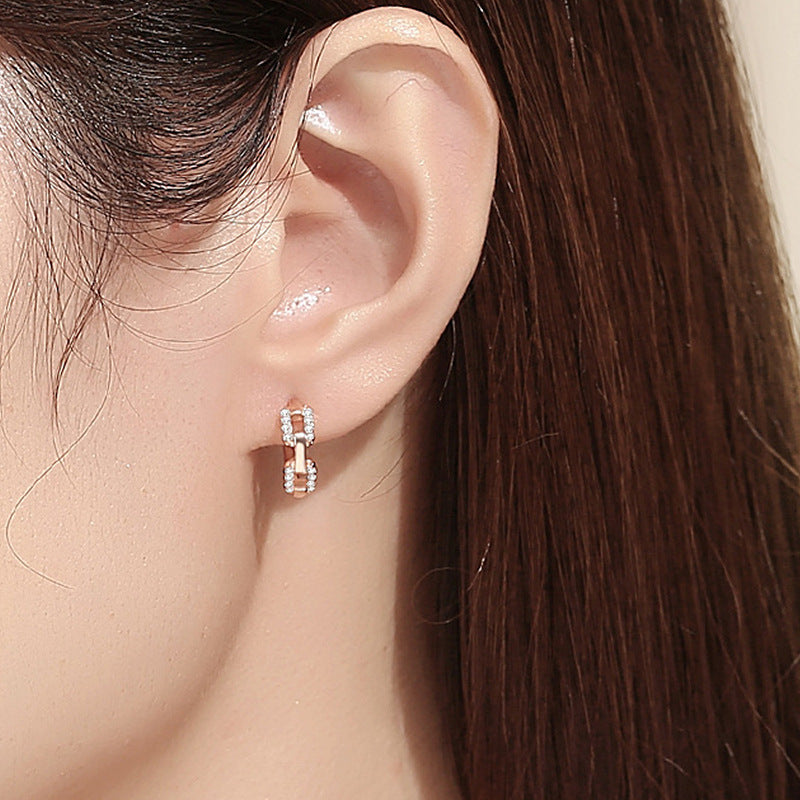 Ladies earrings with sparkling zirconia and modern design Tom Cottons