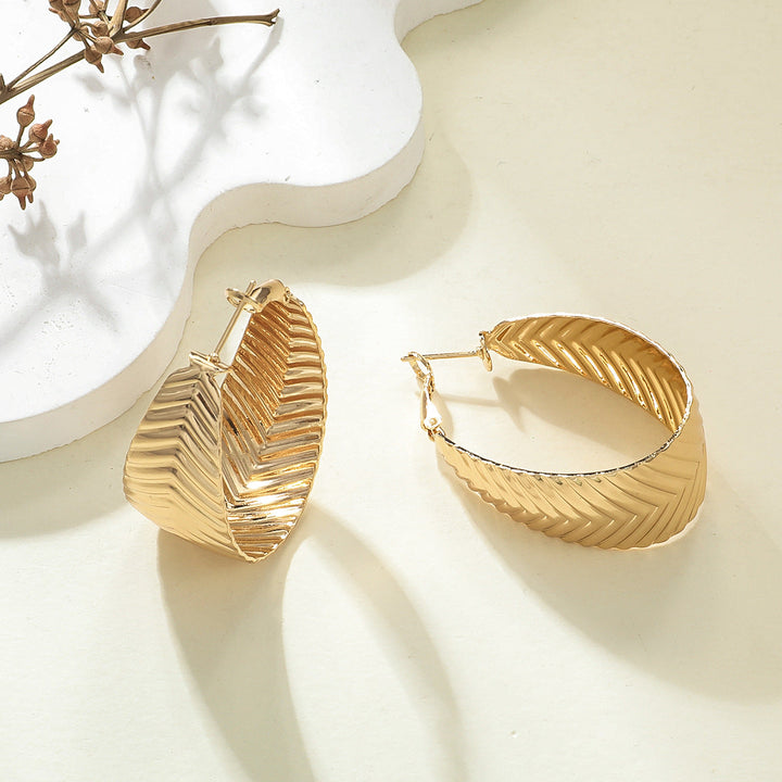 Women's Hanging Earrings in Elegant Wave Pattern Tom Cottons