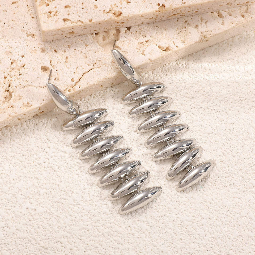 Ladies Hanging Earrings in Modern Spiral Design Tom Cottons