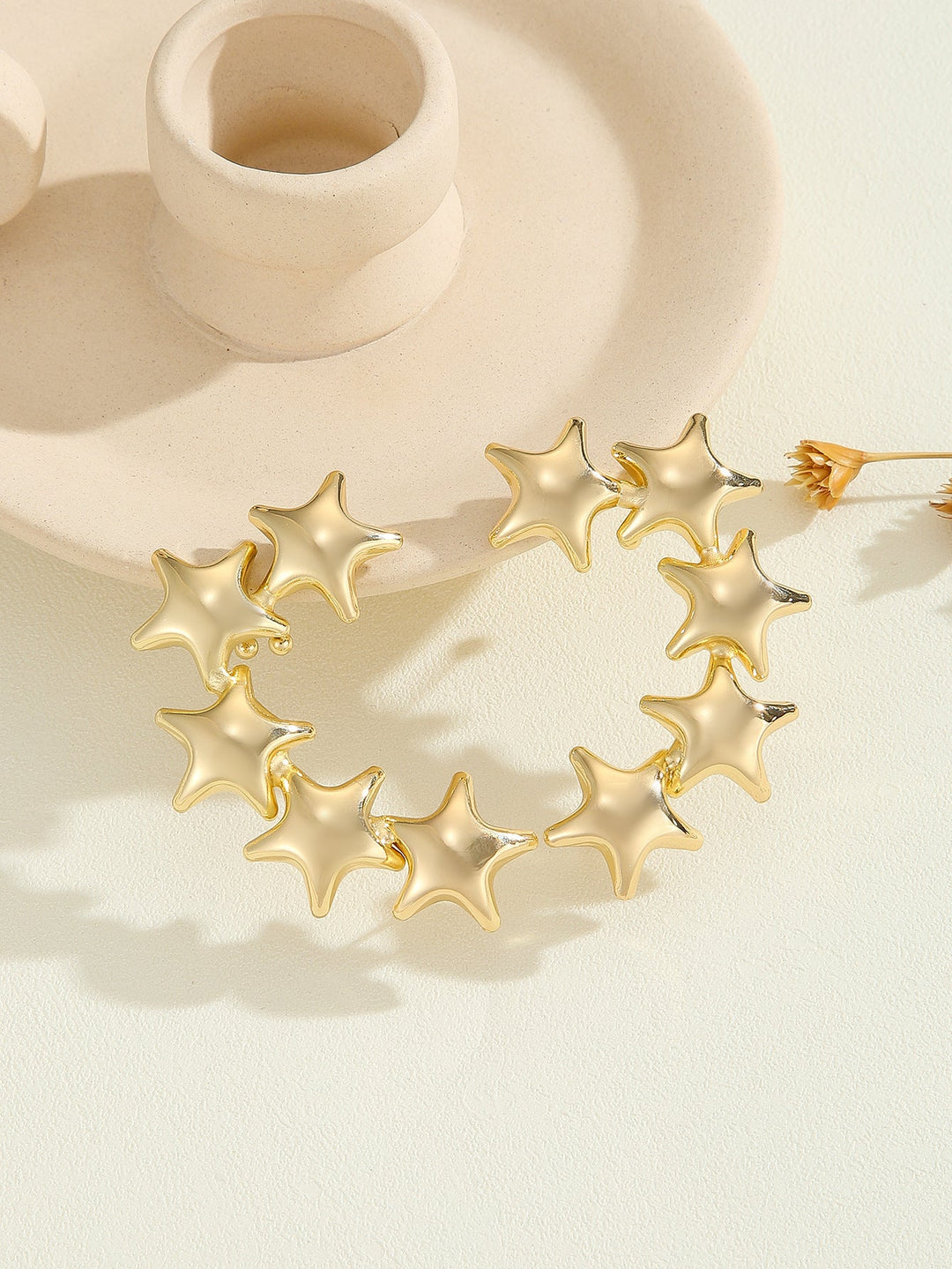 Women's bracelet with structured, golden beads Tom Cottons