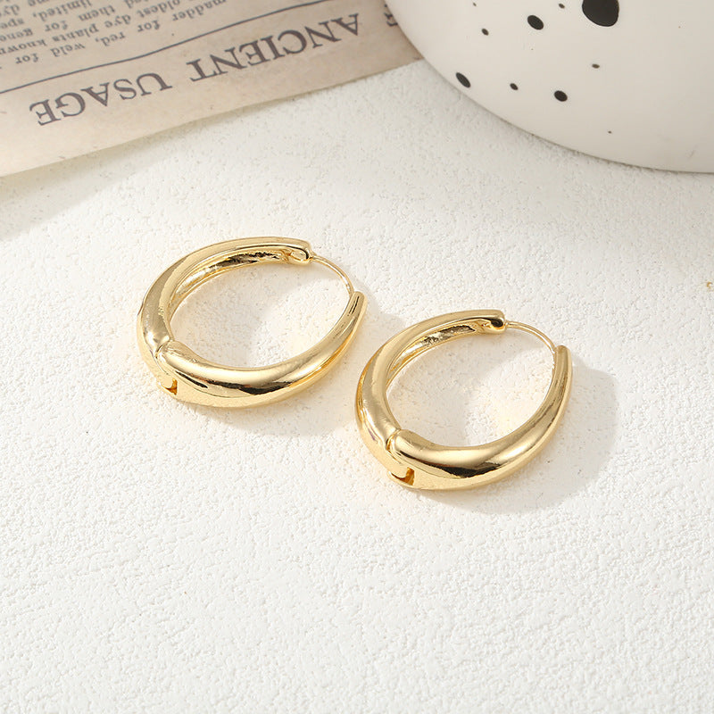 Women's Hoop Earrings with Elegant Curved Design Tom Cottons