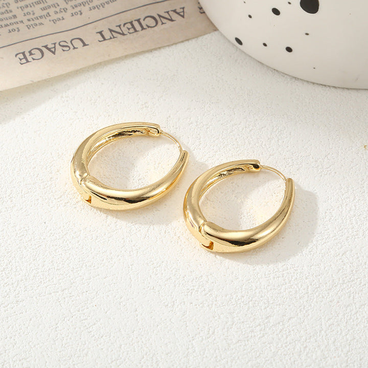 Women's Hoop Earrings with Elegant Curved Design Tom Cottons