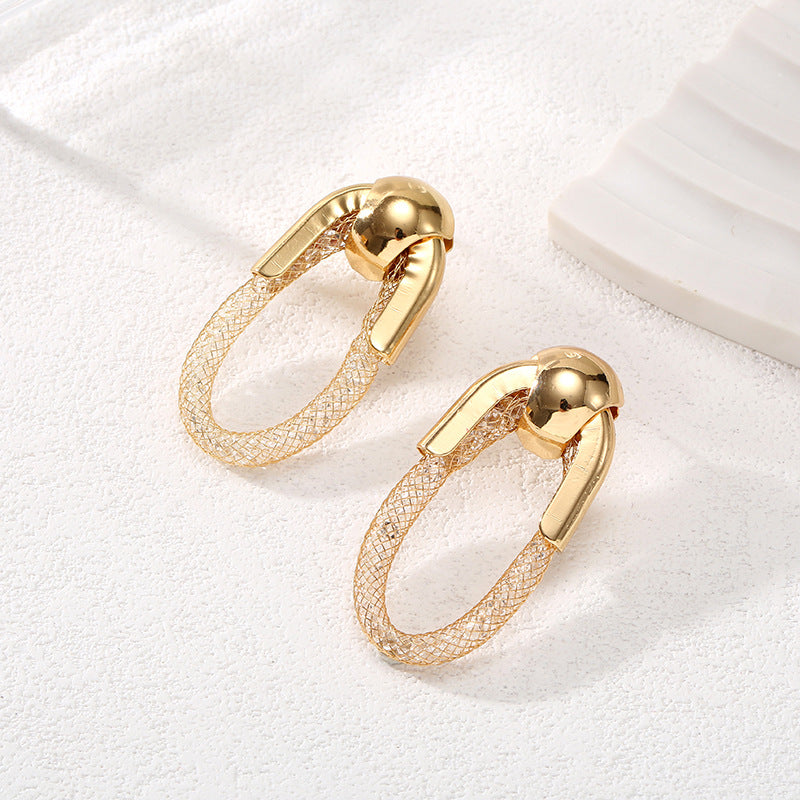 Ladies Hanging Earrings with Innovative, Gold-colored Design Tom Cottons