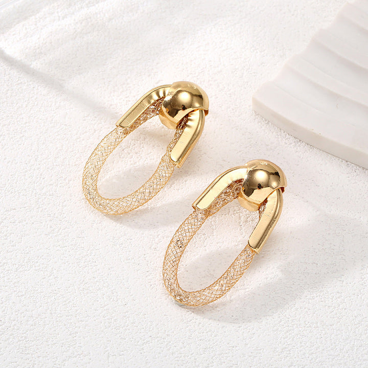Ladies Hanging Earrings with Innovative, Gold-colored Design Tom Cottons