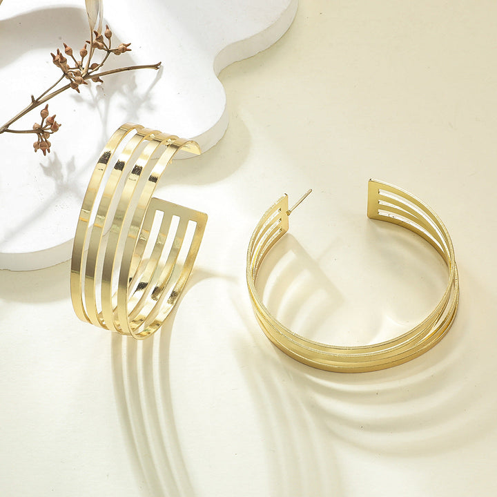 Women's Hanging Earrings in Elegant Wave Pattern Tom Cottons