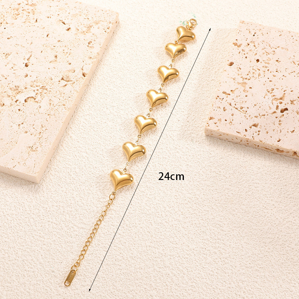 Ladies' bracelet with elegant heart design and fine link chain Tom Cottons
