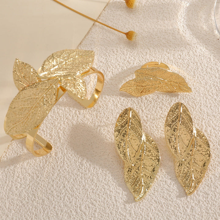 Ladies' bangle with artistic leaf design Tom Cottons