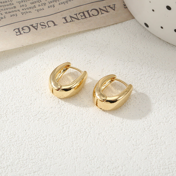 Women's Hoop Earrings with Elegant Curved Design Tom Cottons