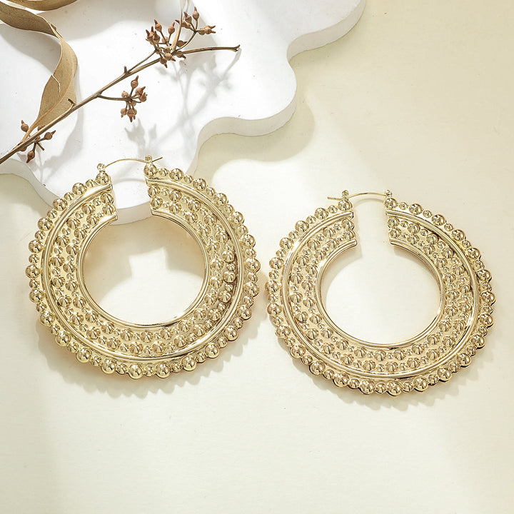Women's Hanging Earrings in Elegant Wave Pattern Tom Cottons