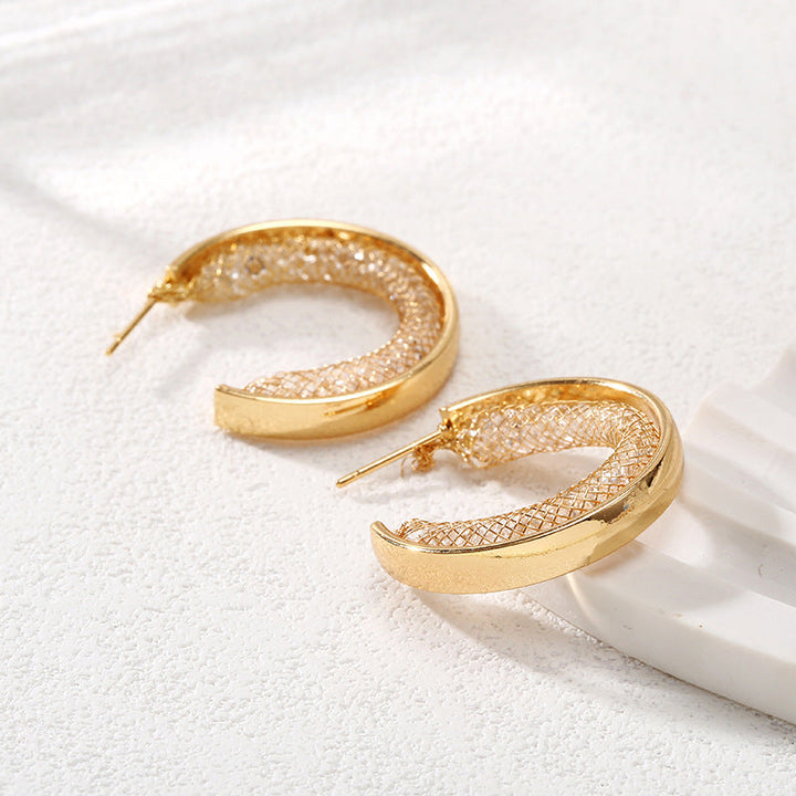 Ladies Hanging Earrings with Innovative, Gold-colored Design Tom Cottons