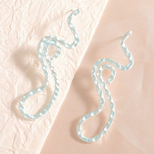 Ladies earrings in elegant wave pattern Tom Cottons