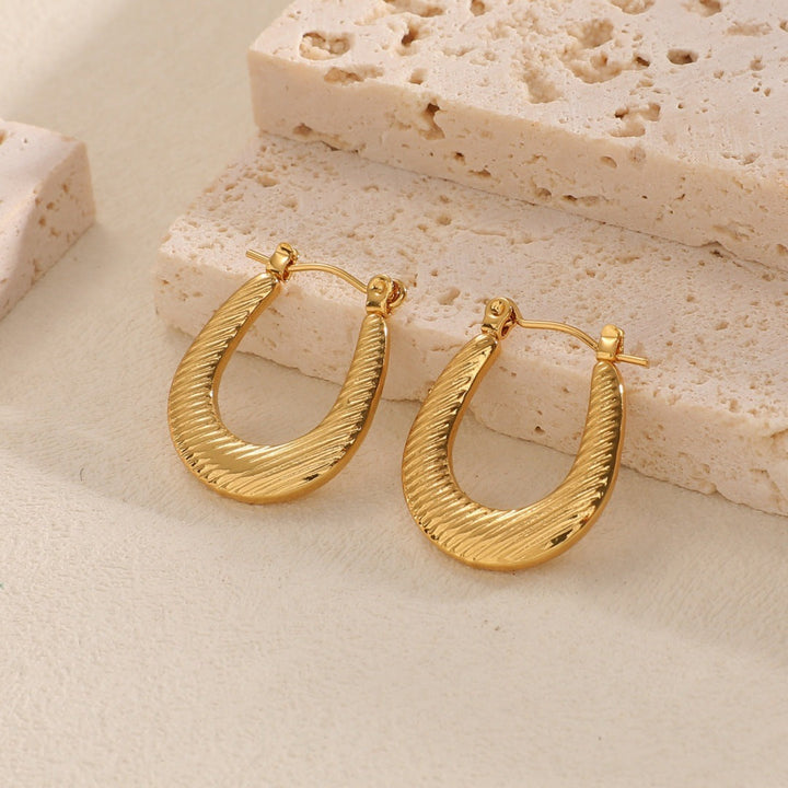 Women's Hanging Earrings with Integrated, Textured Design Tom Cottons