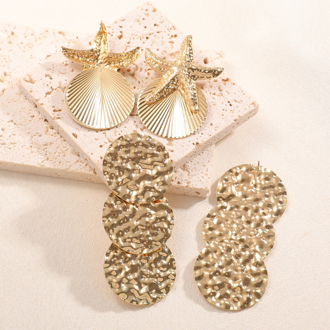 Women's ear clips in luxurious shell and starfish design Tom Cottons