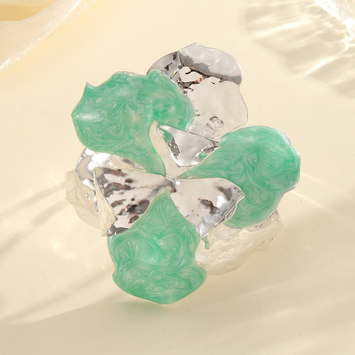 Women's flower-shaped ring made of shiny metal and high-quality epoxy resin Tom Cottons