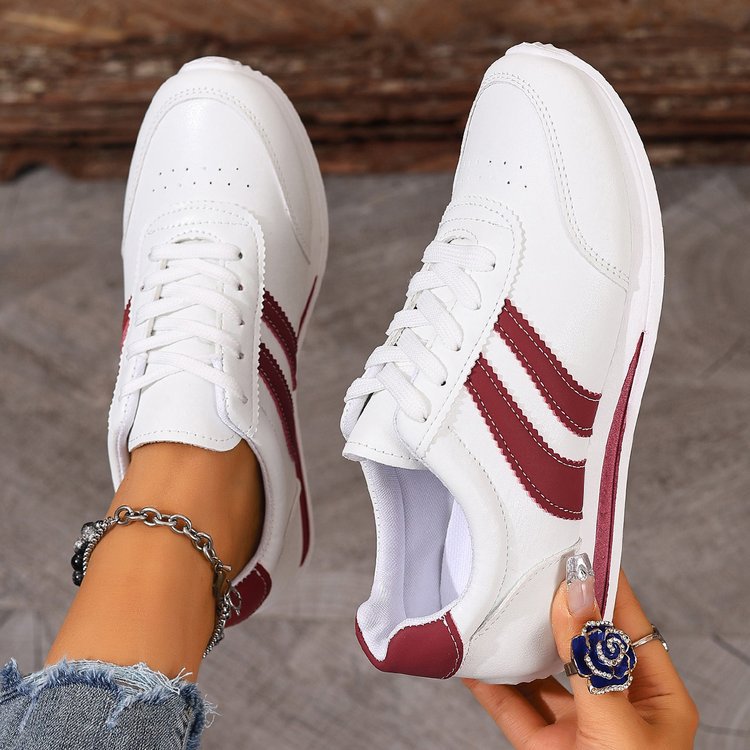 Women classic sneakers with stylish stripes