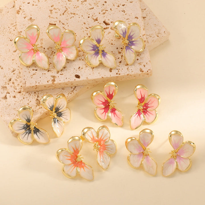 Women's ear clips in elegant floral design with a glossy coating Tom Cottons