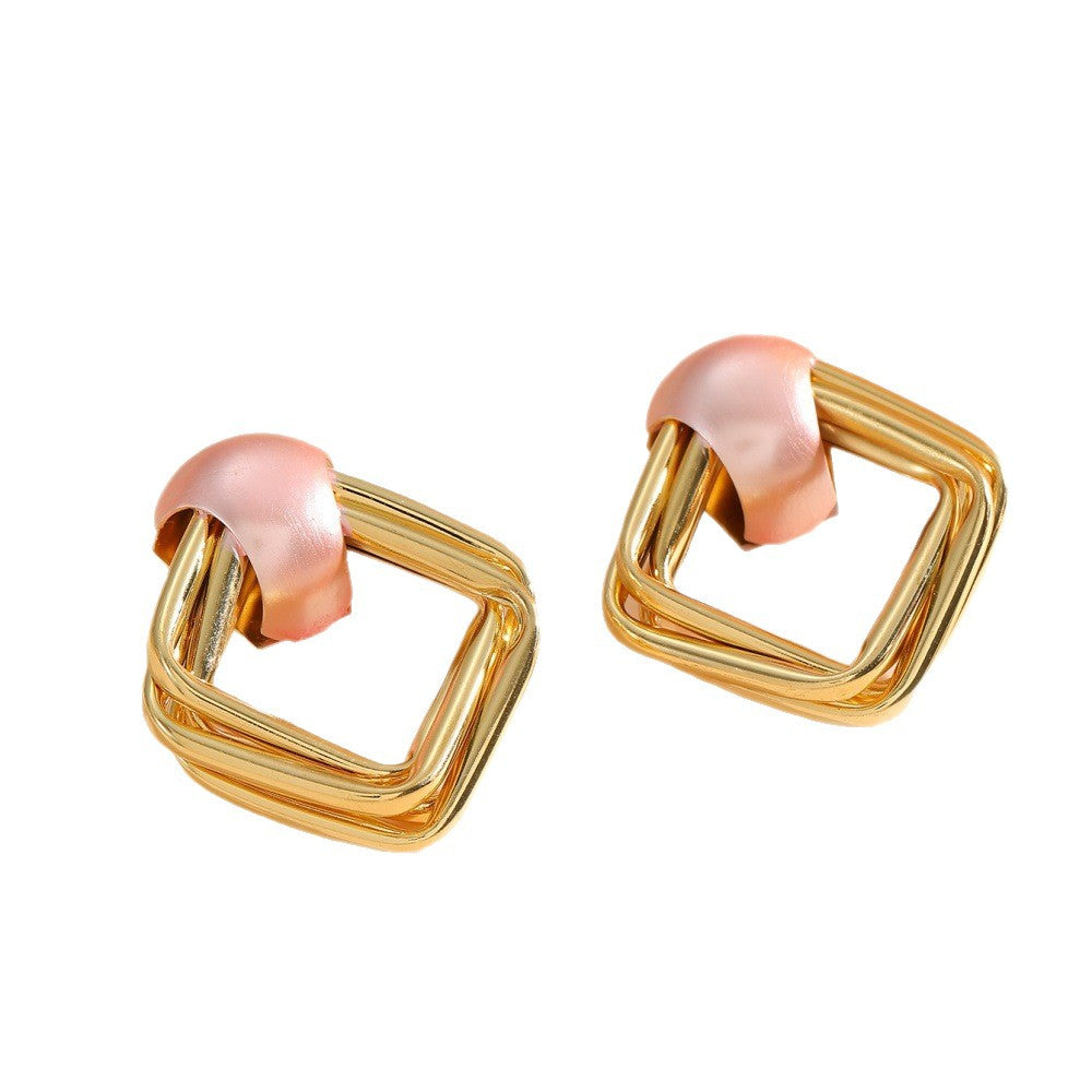 Women modern earrings with asymmetrical design Tom Cottons