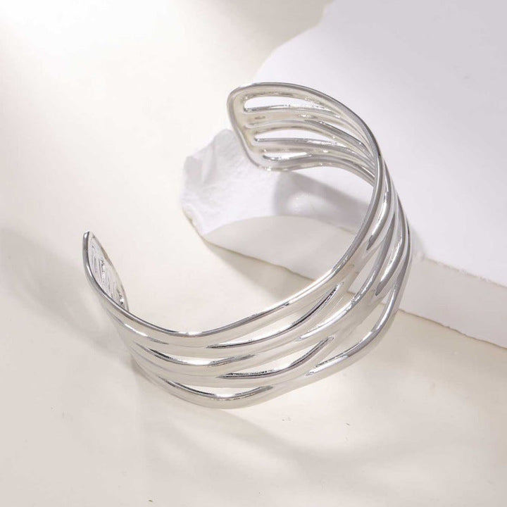 Women's Open Bangle with Elegant Wave Design Tom Cottons