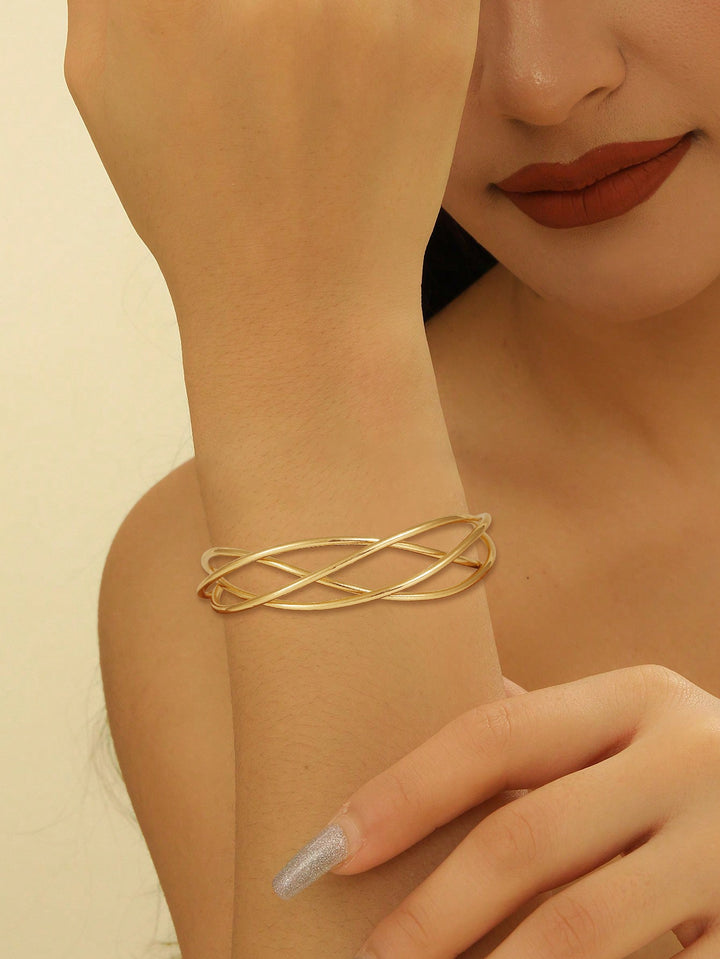 Ladies' bangle with elegant curved design Tom Cottons