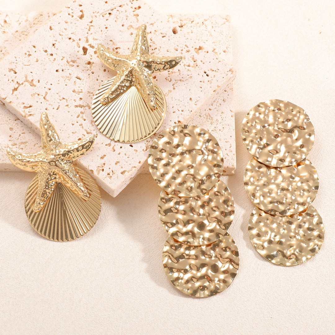 Women's ear clips in luxurious shell and starfish design Tom Cottons