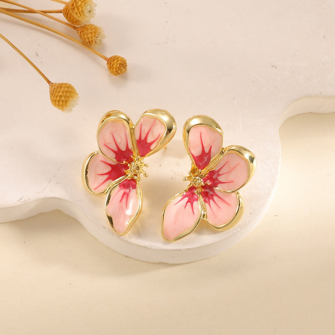 Women's ear clips in elegant floral design with a glossy coating Tom Cottons