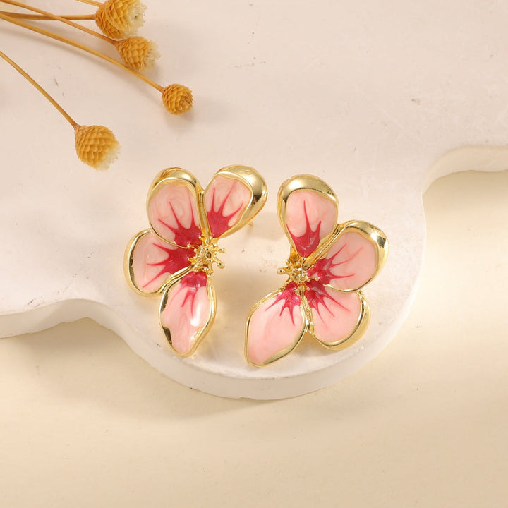 Women's ear clips in elegant floral design with a glossy coating Tom Cottons