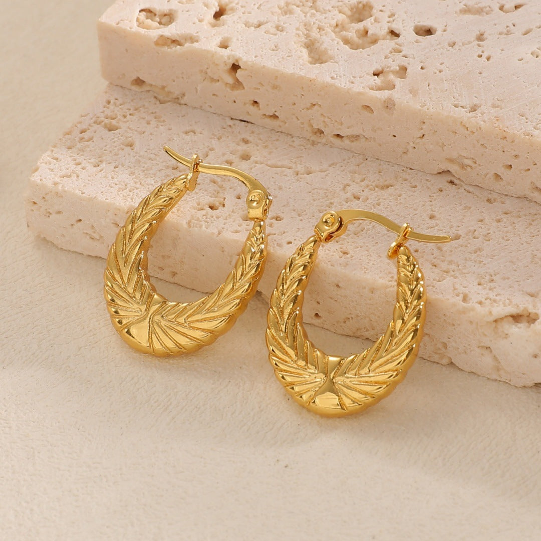 Women's Hanging Earrings with Integrated, Textured Design Tom Cottons