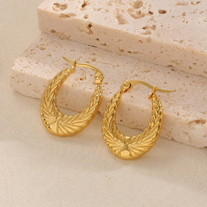 Women's Hanging Earrings with Integrated, Textured Design Tom Cottons