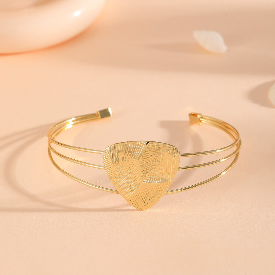 Women's bracelet with intricate bow design Tom Cottons