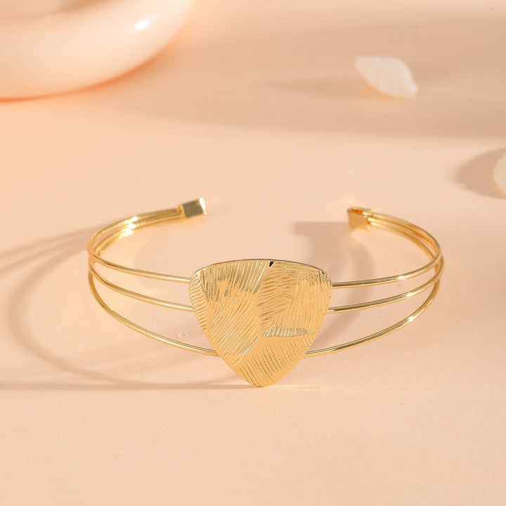 Women's bracelet with intricate bow design Tom Cottons
