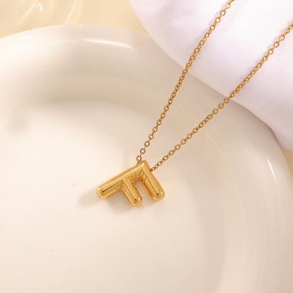 Women's necklace with curved letter pendant Tom Cottons
