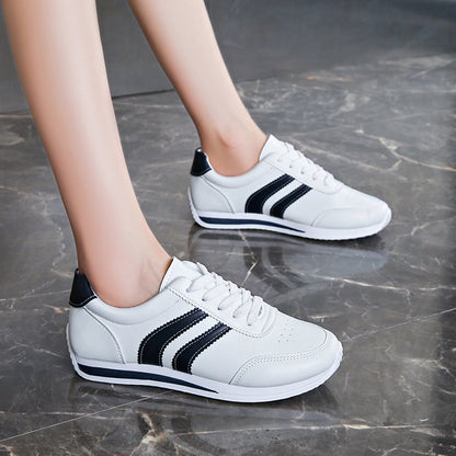 Women classic sneakers with stylish stripes