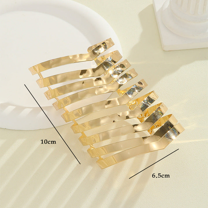 Women's hair accessories with shiny, curved elements Tom Cottons