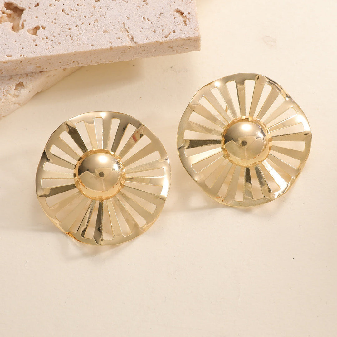 Ladies fashionable statement earrings with luxurious, geometric design Tom Cottons