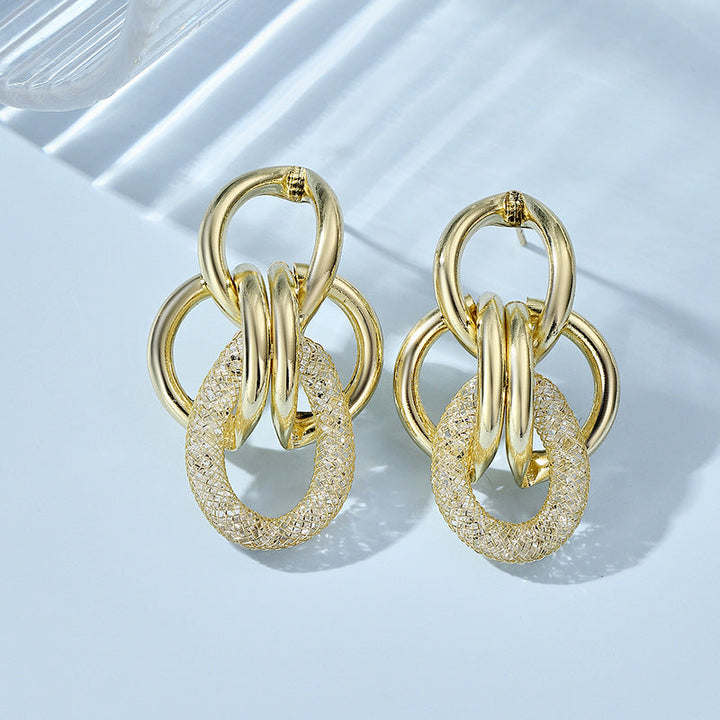 Women's Hanging Earrings with Luxurious, Sculptural Design Tom Cottons