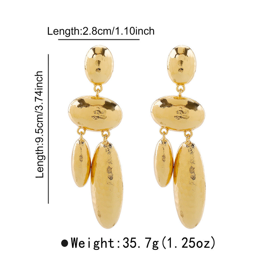 Women Hanging Earrings with artistic, three-dimensional design Tom Cottons