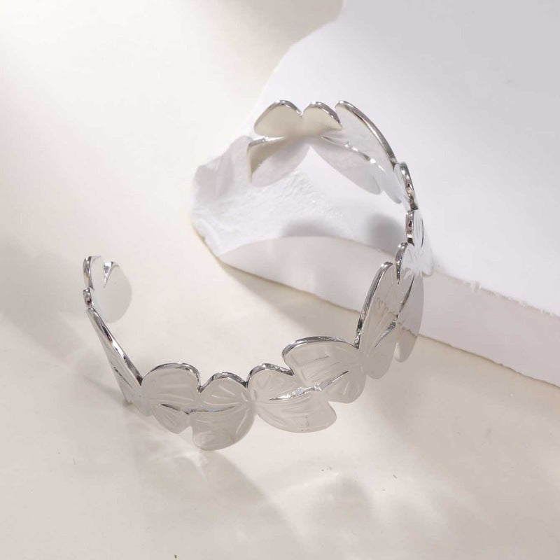 Women's Open Bangle with Elegant Wave Design Tom Cottons
