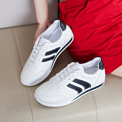 Women classic sneakers with stylish stripes