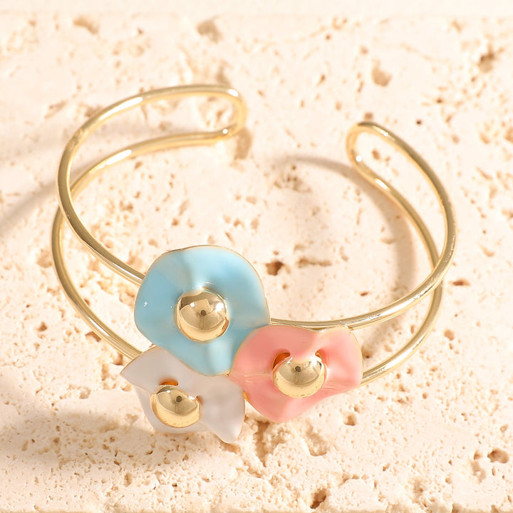 Women's bangle with elaborate floral design Tom Cottons