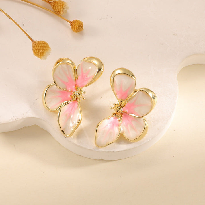 Women's ear clips in elegant floral design with a glossy coating Tom Cottons