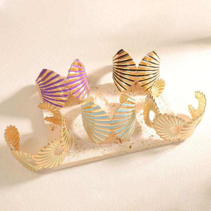 Women's bangle with elegant shell design Tom Cottons